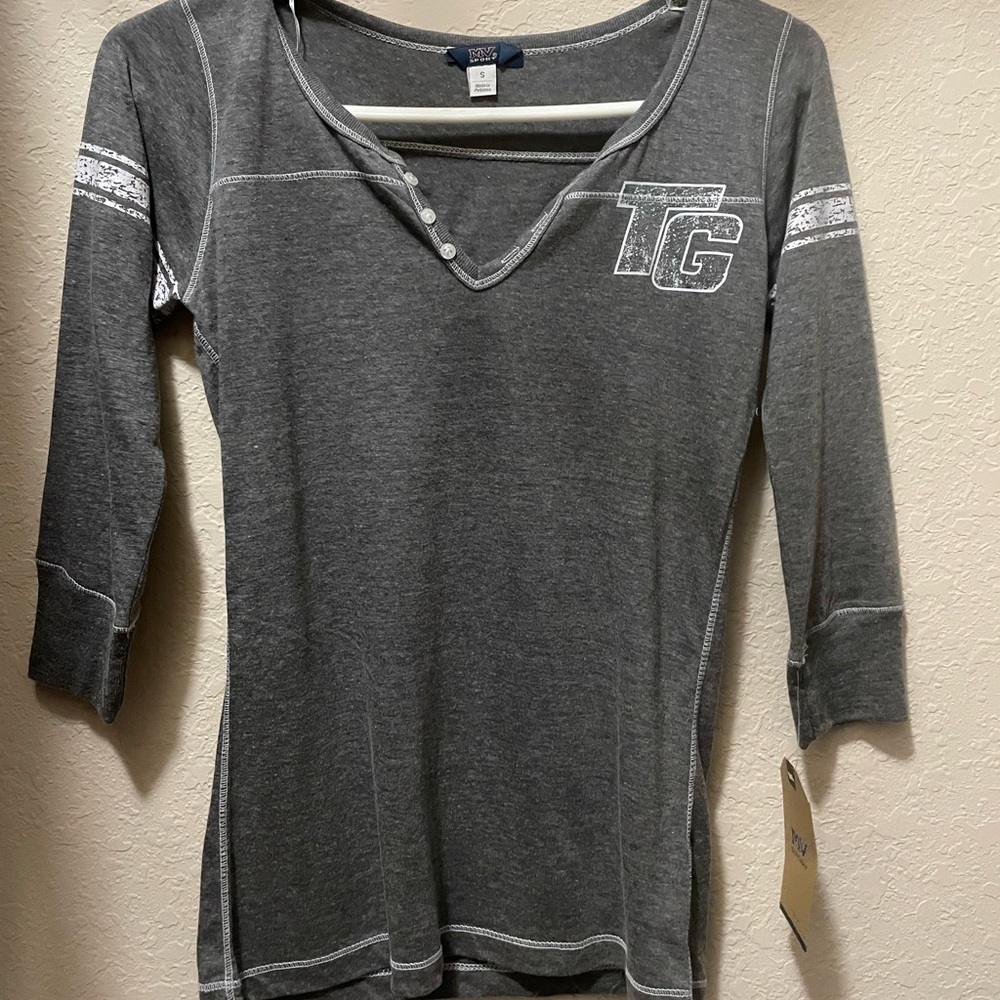NWT Top Gun shirt. Bought at showcase 2021 and does not fit my daughter.
